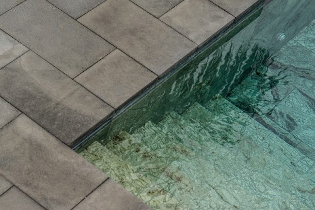 The clear water of a swimming pool during daytime
